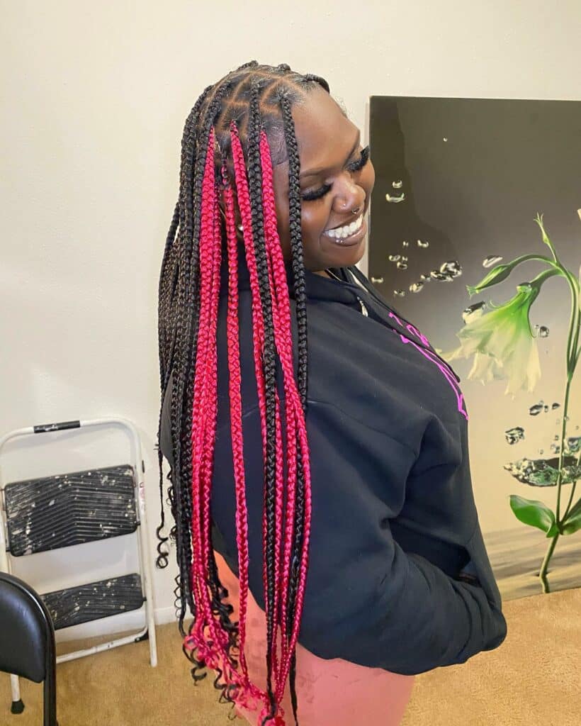 Image of Black and Pink Braids in a style with Pink Braids