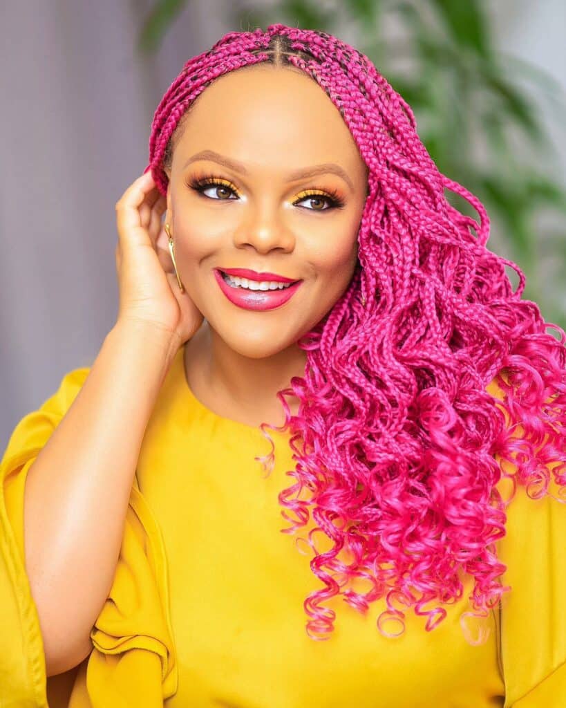 Image of Pink Curly Braids in a style with Pink Braids