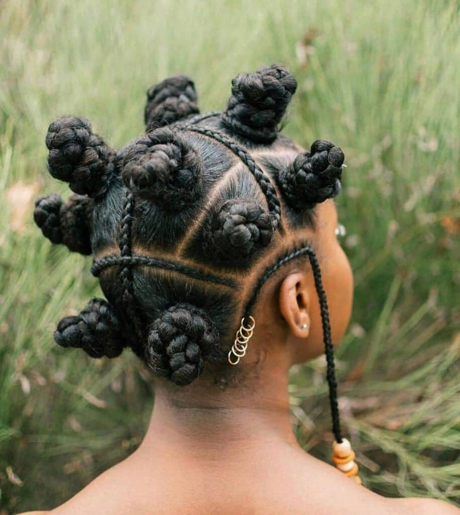 Image of Bantu Knots with Cornrowed Parts in the style of Bantu Knots