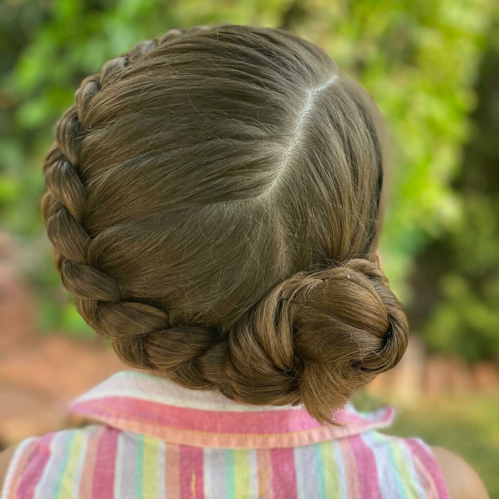 Image of Braided Bun With Side Part in the style of side part braids