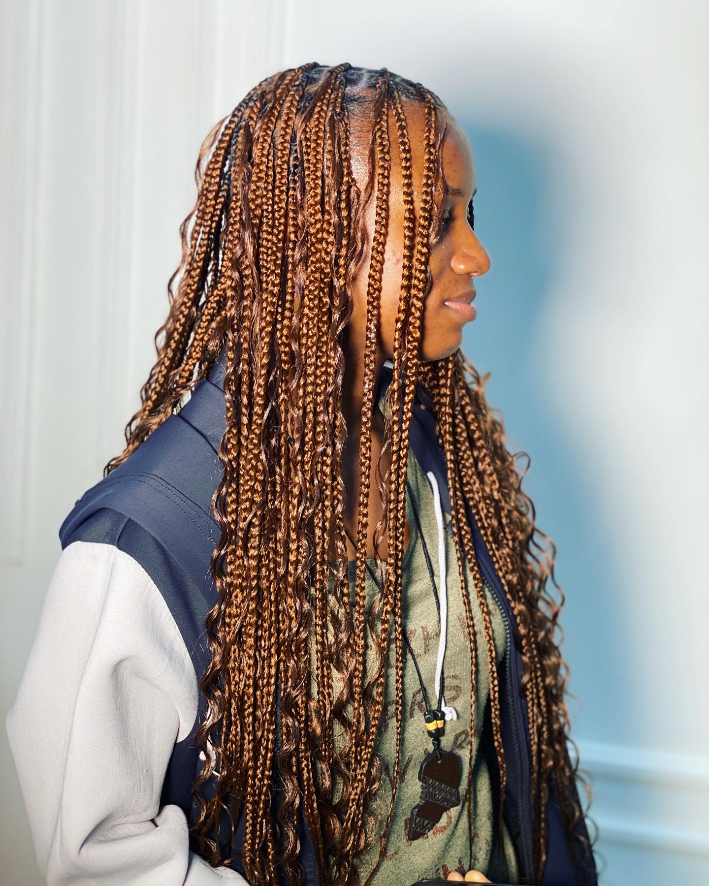 Image of Brown Knotless Braids With Curls in the style of Braids With Curls