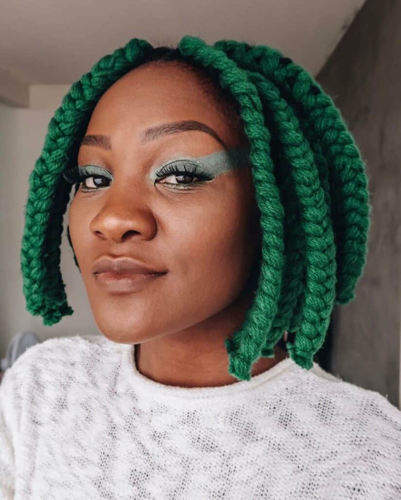 Image of Green Yarn Braids in the style of green braids