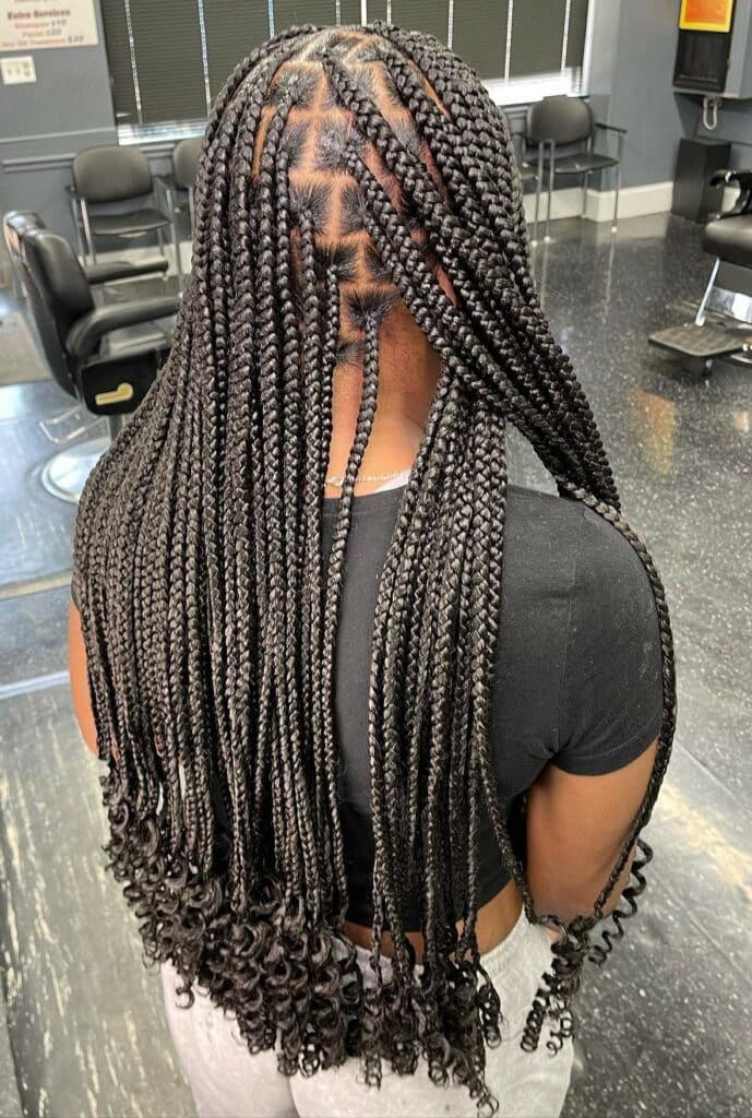 Image of Knotless Box Braids With Curls in the style of box braids