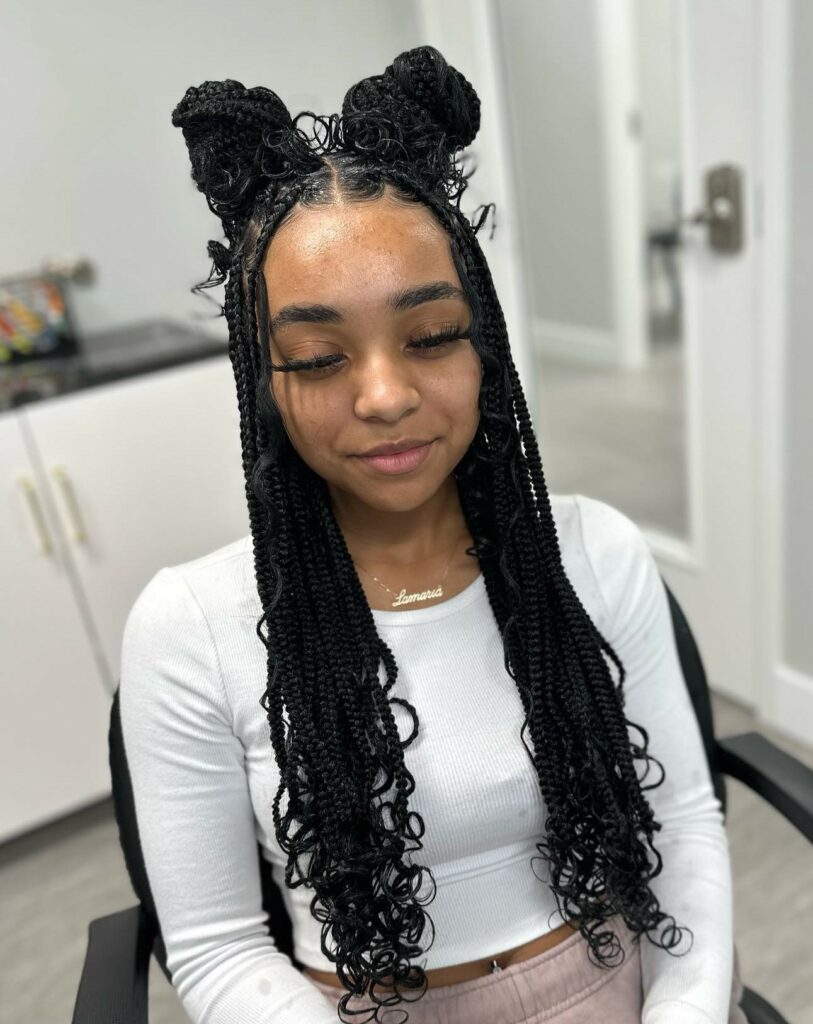 Image of Medium Length Braids With Space Buns as a Medium Length Hairstyle