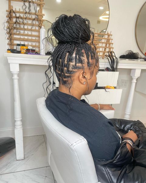 Image of Messy Box Braids Bun in the style of Messy Braids Hairstyles