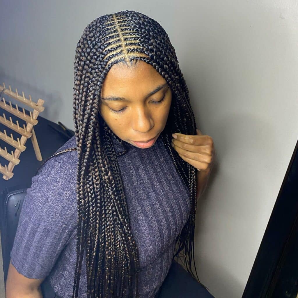 Image of Middle Part Tribal Braids inspired by Tribal Braids Hairstyles