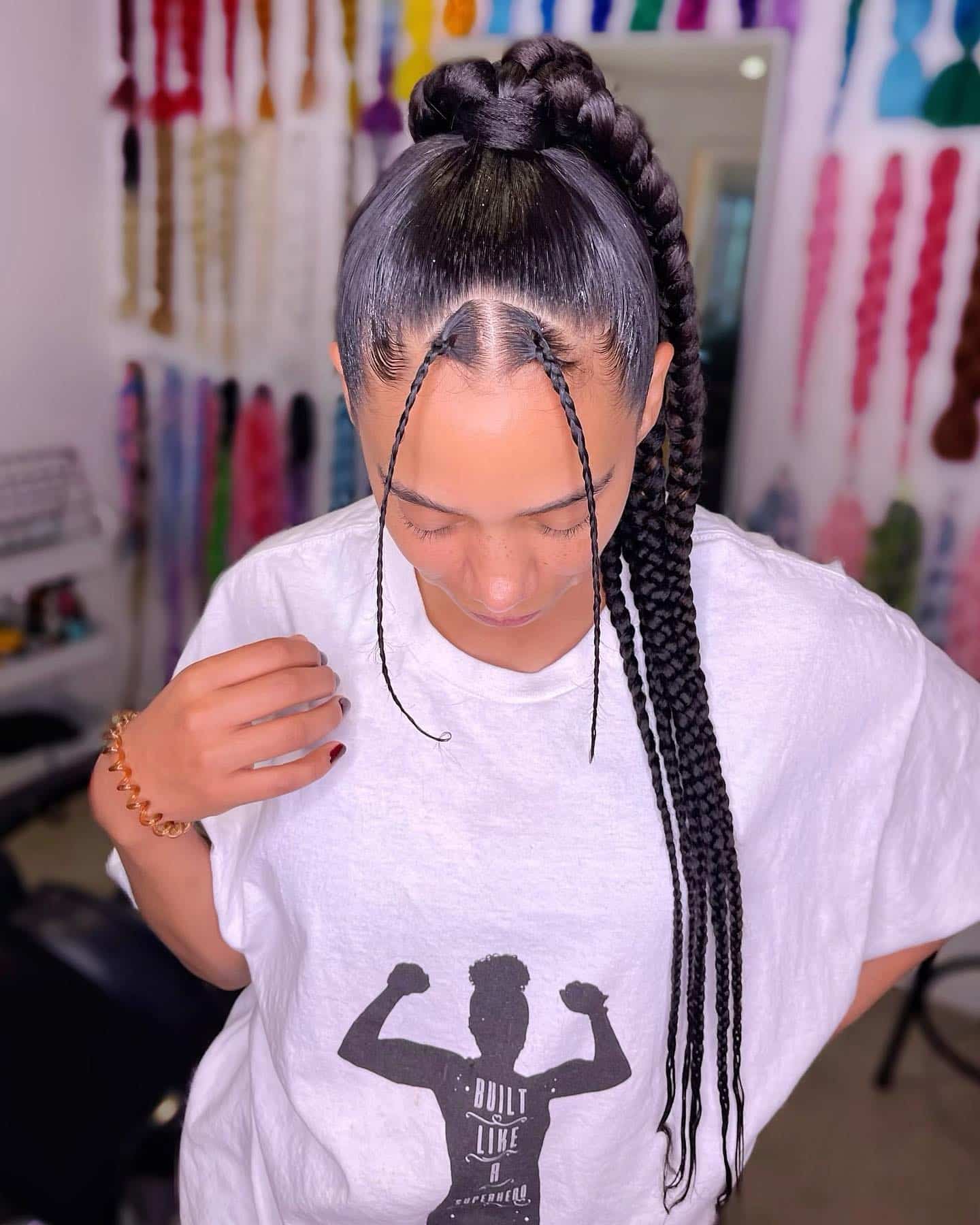 Image of Ponytail with Two Braids in Front in the style of Two Braids