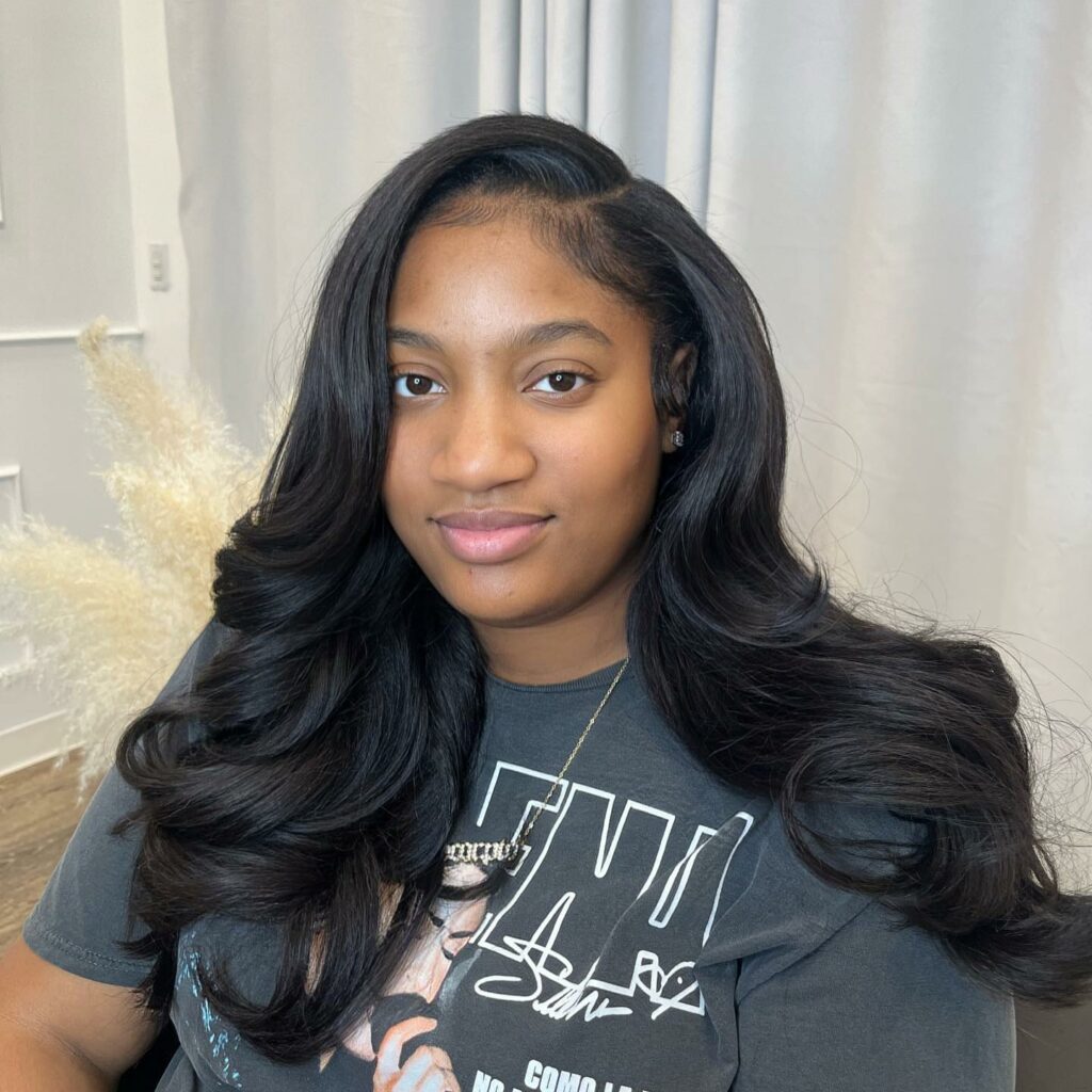 Image of Sew In Hairstyle With Hair Extensions in the style of Braid Extensions
