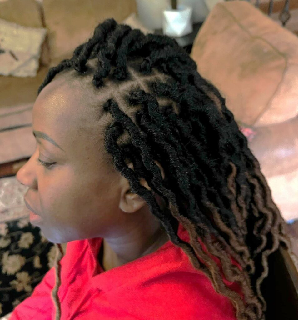 Image of Side Part Faux Locs in the style of side part braids