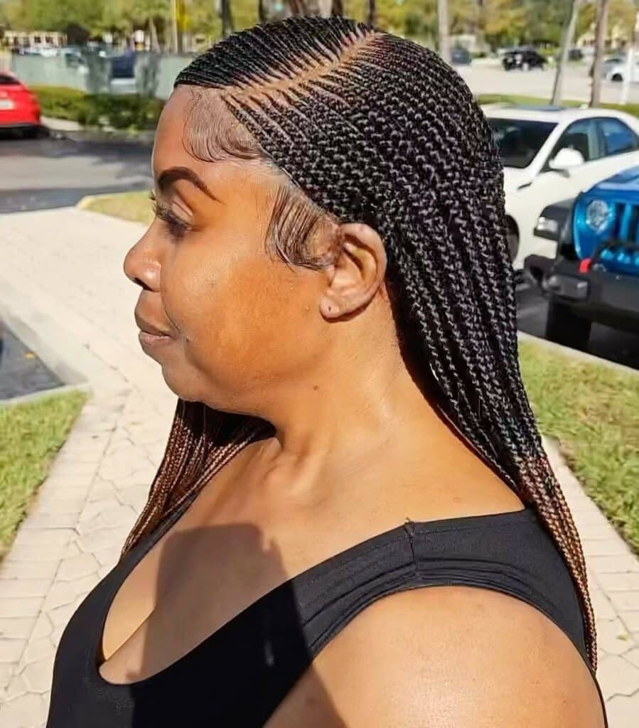 Image of Side Part Feed in Braids in the style of side part braids