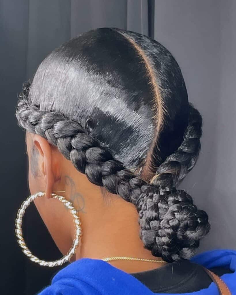 Image of Two Braids into a Bun in the style of Two Braids