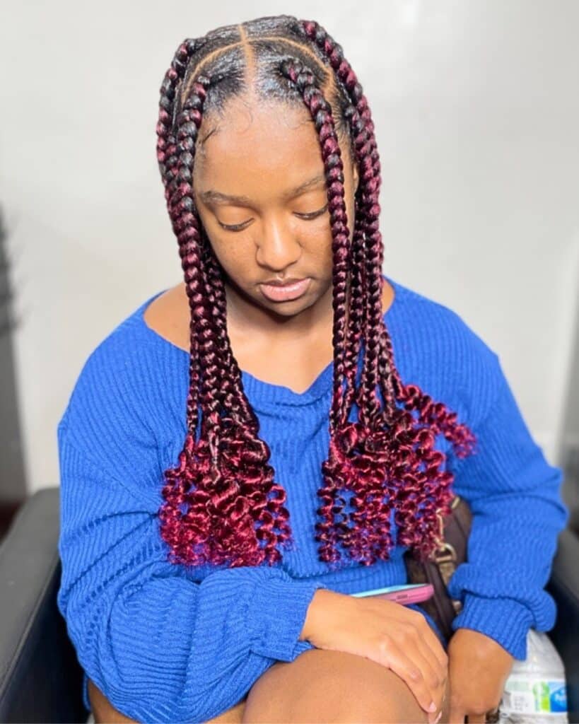 Picture of Burgundy Coi Leray Braids style