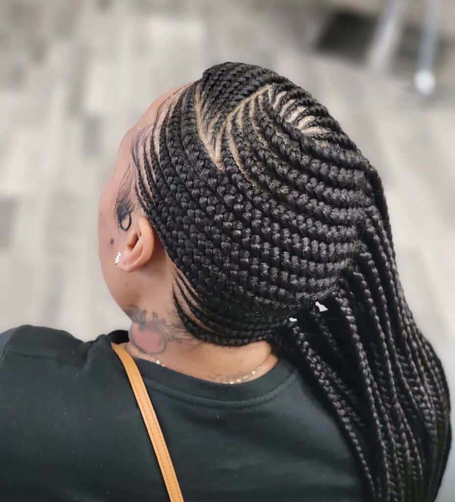 Picture of Side Feed in Braids as a hairstyle with braids on the side